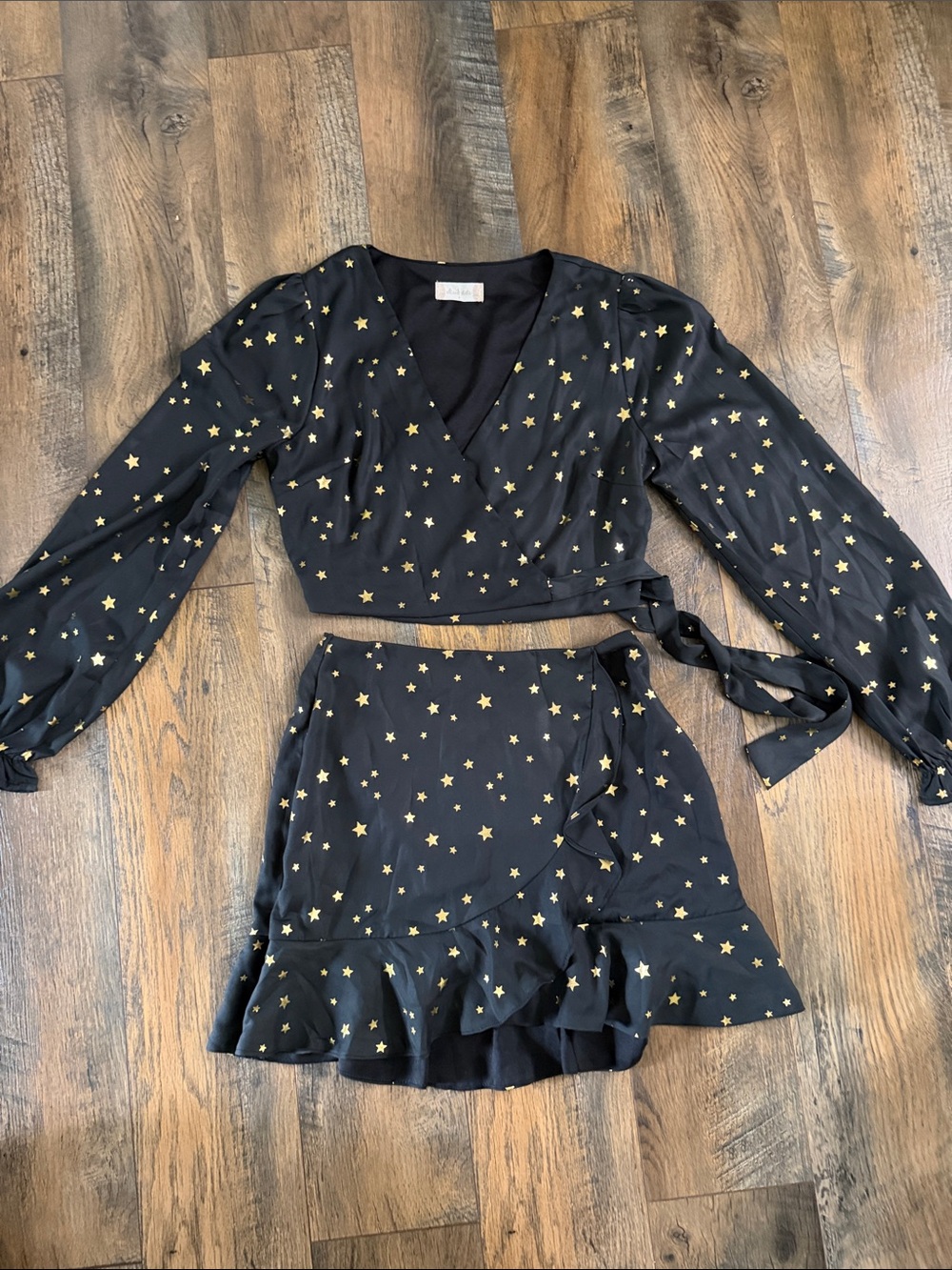 Altar'd State Black Two-Piece Skirt Set with Gold Star Print
